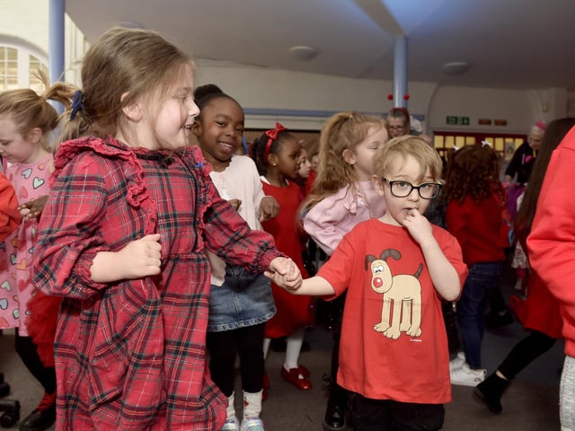 Stamshaw Infant Academy in North End Avenue, Portsmouth, held a Danceathon for Comic Relief on Friday, March 21, 2025. Pictured is: (left) Harlow Hobbs with Woody Hayman. Picture: Sarah Standing (210325-764)