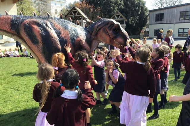 Portsmouth High School pupils meet Sophie the Tyrannosaurus Rex.