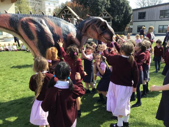 Portsmouth High School pupils meet Sophie the Tyrannosaurus Rex.