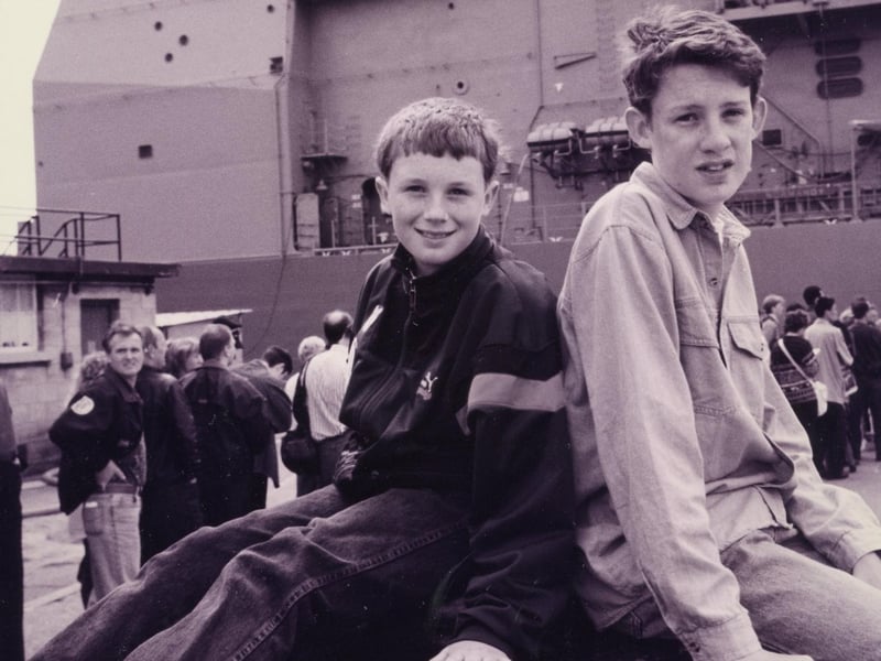 Darren and Ryan Poynter waiting to board USS Normandy at Portsmouth Navy Days, 1994. The News PP4992