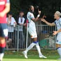 Mo Faal and Danny Wright celebrate after the former had netted Hawks' third goal at Hampton & Richmond. Picture by Dave Haines