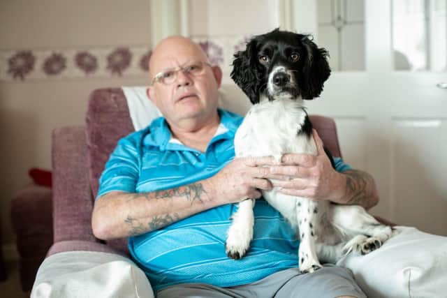Terry Russell was walking his dog, Ollie on the beach at Eastney where he spotted someone who drowning in the sea.
Terry and Ollie lept in the water to rescue the man.
Pictured: Terry Russel and his cocker spaniel, Ollie at his home in Southsea on Tuesday 15 February 2022
Picture: Habibur Rahman
