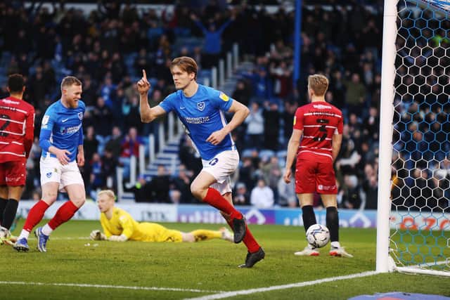 Sean Raggett celebrates his goal from a free-kick against Doncaster. Picture: Joe Pepler