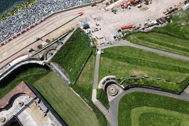 The promenade in front of the bandstand field and castle is coming together