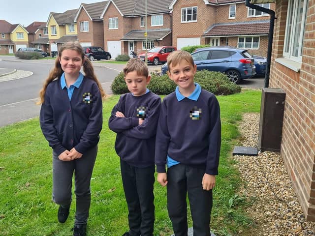Parents from across the Portsmouth area shared photos as their children returned to school after the summer holiday on Thursday, September 2, 2021. Pictured is Gracie, aged nine, Lee Jr, and Micky, aged eight. 