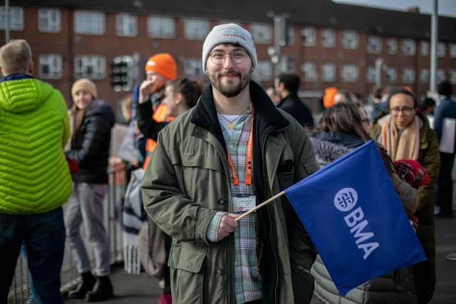 Junior doctor Matt Smith outside the entrance to QA Hospital Picture: Habibur Rahman