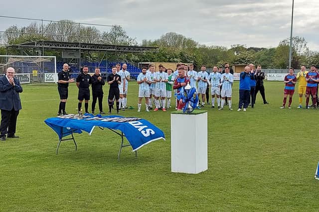 Hamworthy United's Steve Devlin about to collect his man of the match award following the Hammers' 3-1 win over US Portsmouth in the Wessex League Cup final at AFC Portchester this afternoon.