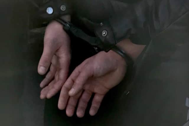 Police have arrested a 58-year-old man from Portsmouth on suspicion of fraud, money laundering and theft after a raid on a business in the city.