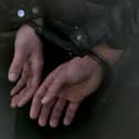 Police have arrested a 58-year-old man from Portsmouth on suspicion of fraud, money laundering and theft after a raid on a business in the city.