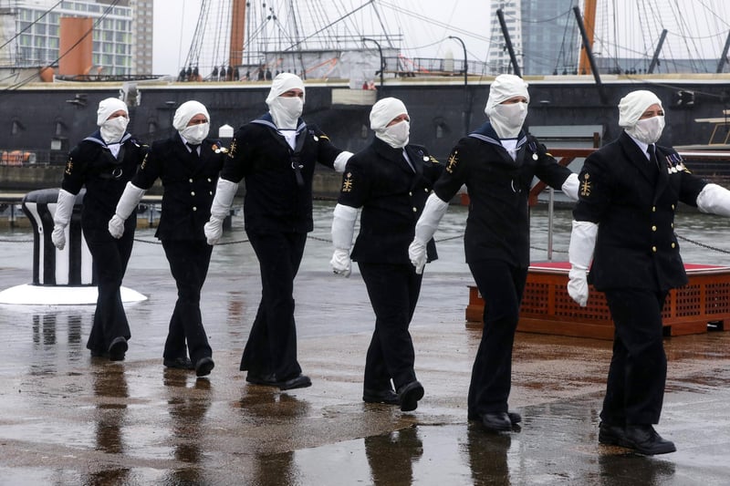 The firing party marching in formation.