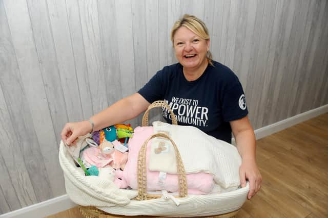 Baby Basics Portsmouth, based at the Empower Centre in Portsmouth, runs a volunteer-led Portsmouth baby bank which works with health care professionals who refer mums who cannot afford items for their new baby and provide them with a hamper of goods.Pictured is: Diane Urquhart, manager, of the Baby Basics Portsmouth.Picture: Sarah Standing (110820-2476)