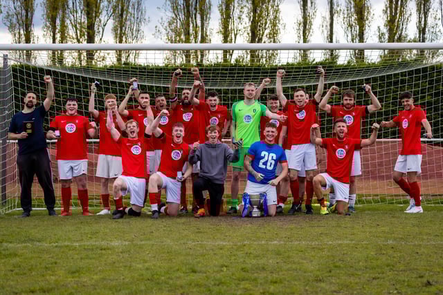 Gosport Town celebrate after winning the Portsmouth & District FA Trophy. Picture: Alex Shute