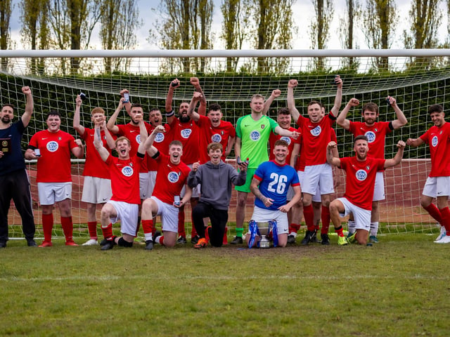 Gosport Town celebrate after winning the Portsmouth & District FA Trophy. Picture: Alex Shute
