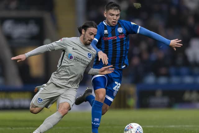 Rochdale midfielder Aaron Morley, right, is close to a move to Pompey's League One rivals Bolton Wanderers.