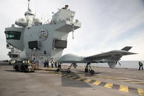 Pictured: Mojave aircraft is taken back into the hanger after a successful trail on HMS Prince of Wales. Picture: LPhot Unaisi Luke.