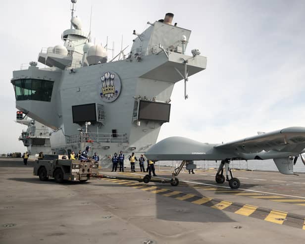 Pictured: Mojave aircraft is taken back into the hanger after a successful trail on HMS Prince of Wales. Picture: LPhot Unaisi Luke.