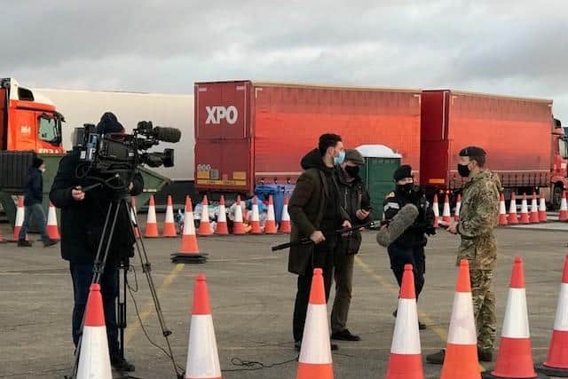 Lt Amy Blake, a Royal Navy reservist based in Portsmouth, pictured with the press supporting the military's media coverage during the coronavirus testing crisis at Christmas. Photo:Royal Navy