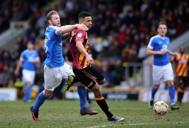 James Meredith (right), during his Bradford days, battling with Peterborough's Craig Mackail-Smith. Picture: Joe Dent/JMP
