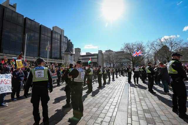 Police kept the protestors apart. Picture: Chris Moorhouse (150325-062)