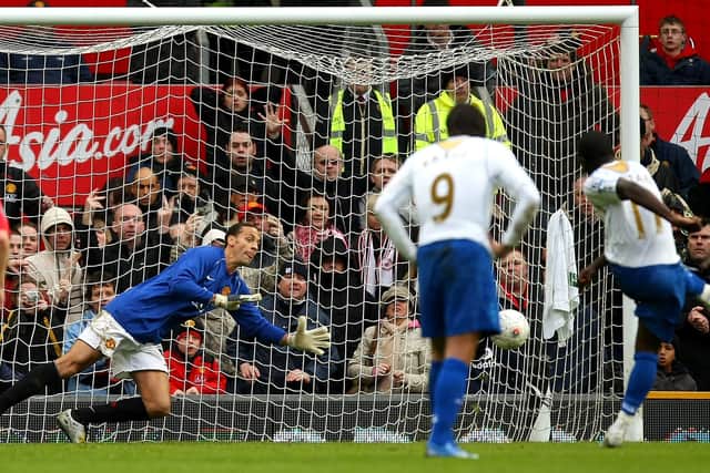 Sulley Muntari scores past stand-in Manchester United goalkeeper Rio Ferdinand during Pompey's FA Cup win at Old Trafford in 2008. Picture: Richard Heathcote/Getty Images