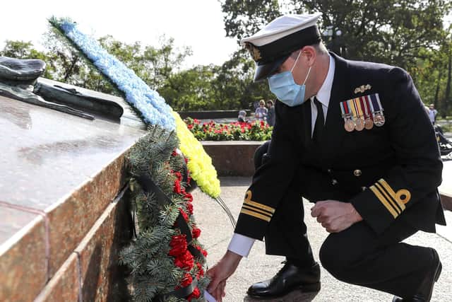 Ship’s company of HMS Dragon paid their respects to the Ukrainian War memorial of the unknown sailor, in Odesa. Picture: LPhot Hutchins
