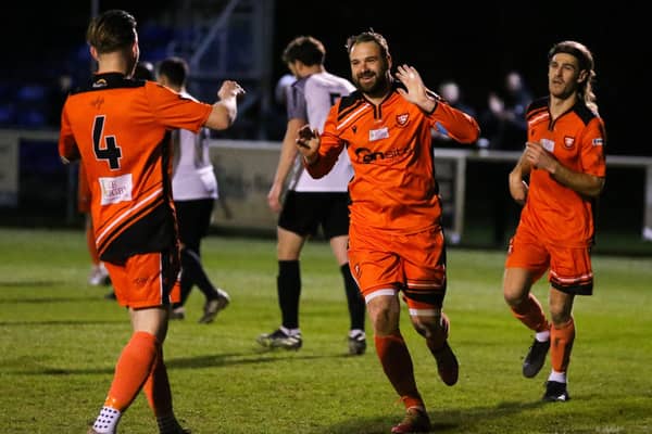 Brett Pitman celebrates his first goal against Pagham last night. Picture by Nathan Lipsham