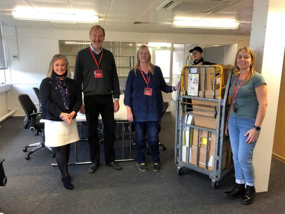 MOVING IN. Beverley Poole, left, Fareham College’s Director of Business Centres, welcomes Hampshire Chamber team members Ross McNally, Chief Executive and Executive Chairman, Eddie Bell, Accounts Executive, and far right, Jackie Highmore, International Trade Manager. Standing behind, second from right, is Brendan Ross from The Recycled Assets Company.