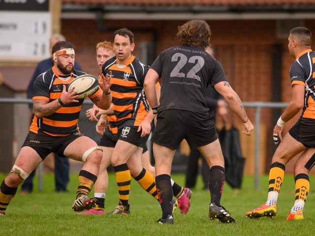 Portsmouth (orange/black) v Andover. Picture by Keith Woodland