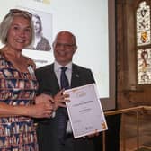 Sarah Warrington collects her Laying the Foundations Award