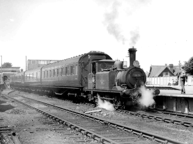 Taken in June 1962. It shows 'A1X' 0-6-0 tank No.32678 ready to leave the bay platform adjacent to Havant down main platform.Weighing just 28 tons, these diminutive locos were ideal for the four and a half mile journey to Hayling as they had to pass over the wooden bridge that crossed Langstone Harbour.