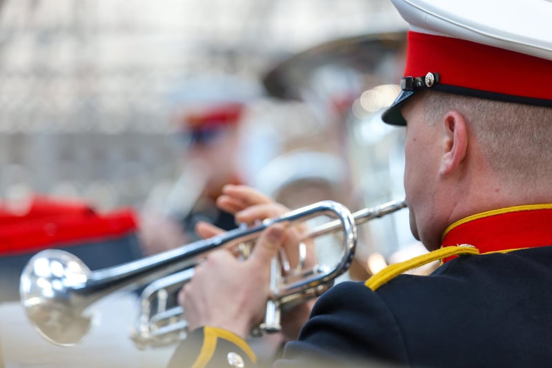 Pictured:  The Royal Marines Band perform during the ceremony onboard HMS Victory.