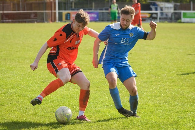 Action from the 2-2 draw between AFC Portchester under-23s (orange and black kit) and Liphook United. Picture: Keith Woodland (150421-823)