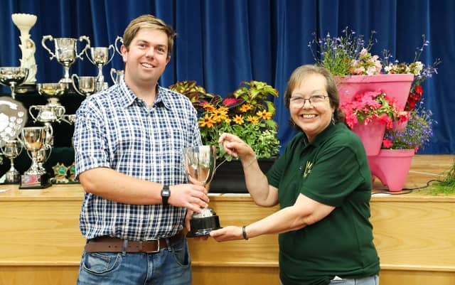 Lynda Piddington hands out an award at the Purbrook Horticultural Society Summer show.