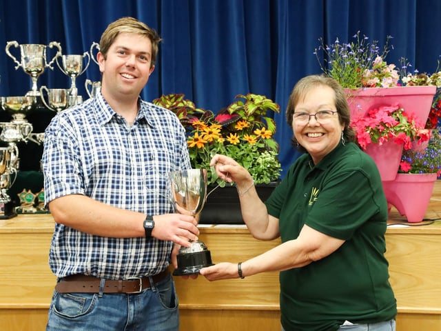 Lynda Piddington hands out an award at the Purbrook Horticultural Society Summer show.