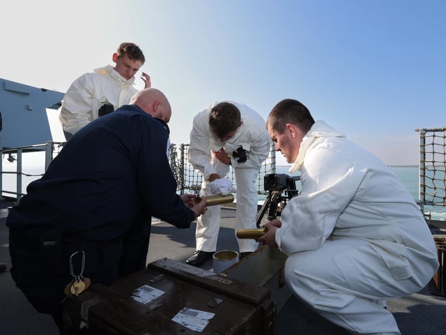 Pictured ship's company ceremonial firing party.
