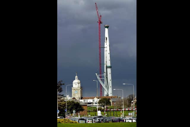 The tower seemingly dwarfed by the high tower crane used  to construct the sails, April 2004. Picture: Michael Scaddan (042003-0014)