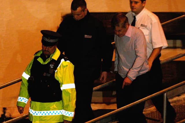 Peter Tobin being taken from Dundee High Court on December 2, 2008 in Dundee, Scotland. Peter Tobin has been found guilty on December 2, 2008 of the murder of Falkirk schoolgirl Vicky Hamilton, who disappeared more than 17 years ago. He has been sentenced to a minimum of 30 years in jail. Picture: Jeff J Mitchell/Getty Images.