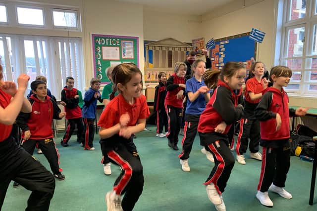 Year 5 pupils take part in marathon dance challenge.