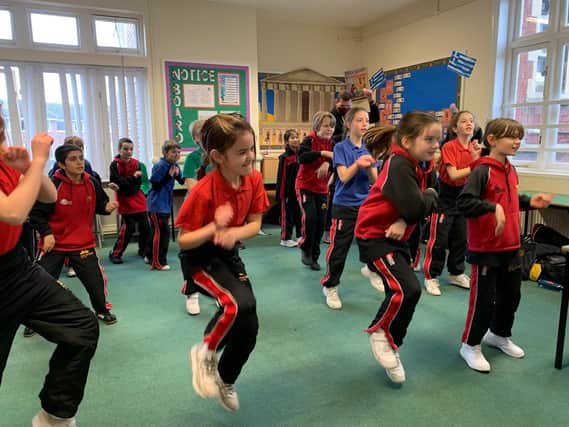 Year 5 pupils take part in marathon dance challenge.