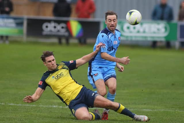 Former Moneyfields defender Conor Bailey, right, was sent off for AFC Portchester at Dover Road. Picture: Stuart Martin (220421-7042)