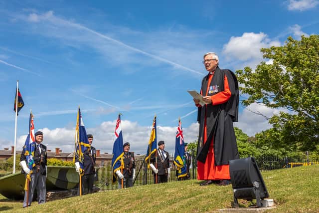 Reverand Roland Wort RN addresses the assembled parade of veterans and standard bearers. Picture: Mike Cooter (210522)