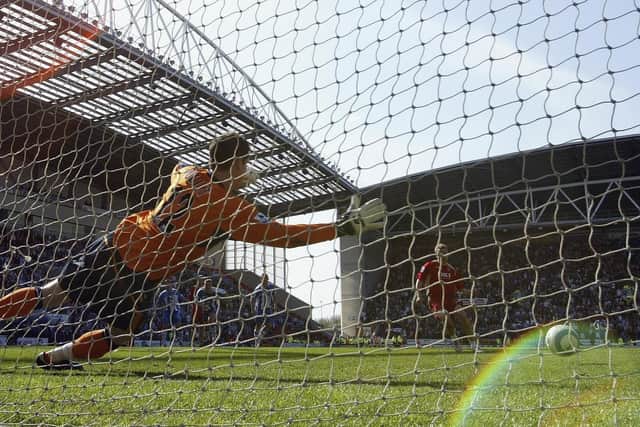 The goal which kept Pompey in the Premier League - Matt Taylor's penalty against Wigan in April 2006. Picture: Ross Kinnaird/Getty Images