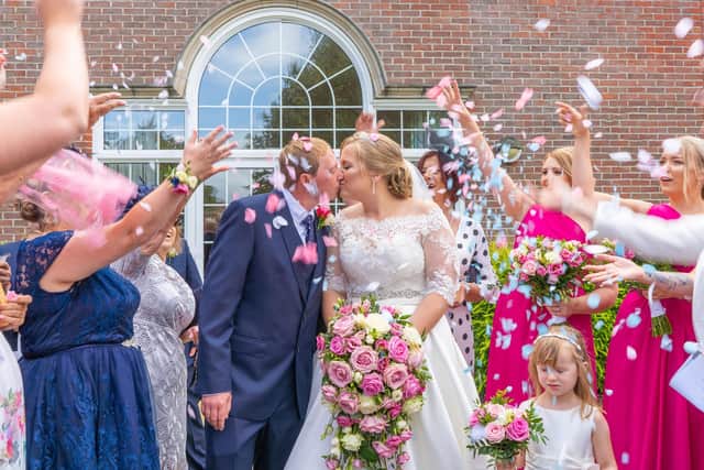 Matthew and Abi on their wedding day. Picture: Carla Mortimer Photography