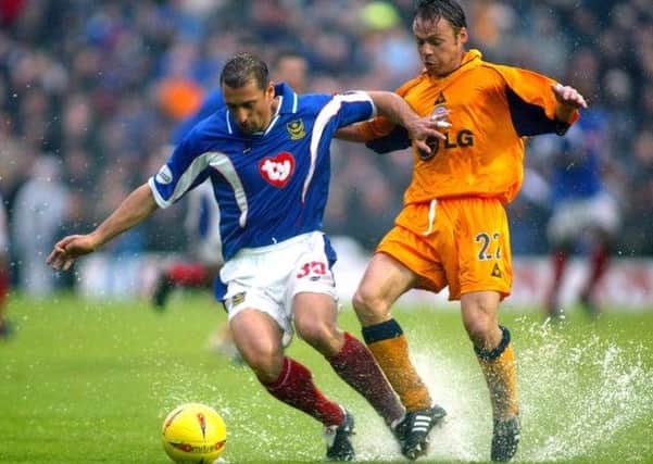 Gianluca Festa holds off Paul Dickov during the infamous November 2002 clash with Leicester at Fratton Park