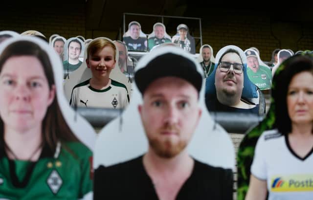 Cardboard cut-outs of Borussia Moenchegladbach's supporters.  Picture: Ina FASSBENDER / AFP