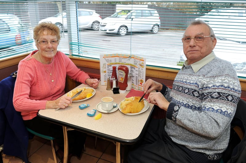 2014. Mother Kelly's Fish and Chip shop in Portsmouth. Pictured is: Kathy Ellis (76) and Roger Nicholson (75) from Gosport. Picture: Sarah Standing 143551-3074
