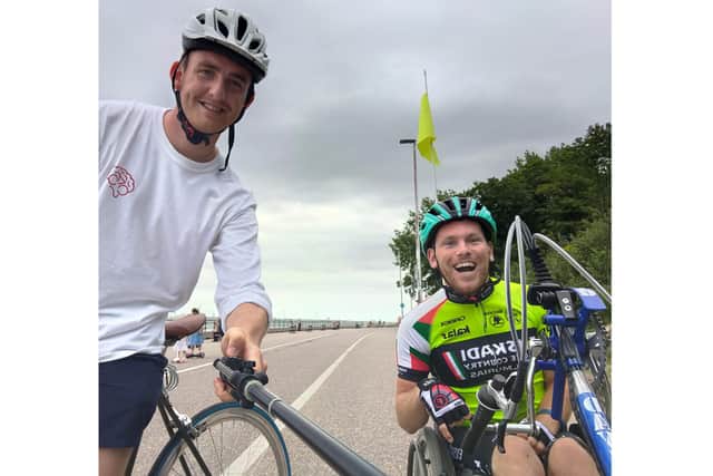 Harrison Read, 23, has filmed a documentary about cycling and mental health. Pictured: Harrison with Ellis Palmer