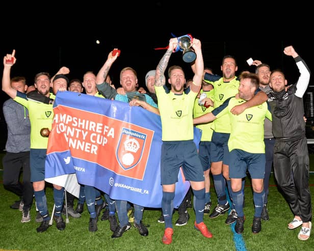Harvest Home celebrate winning the Hampshire Vase following a 4-1 final win over FC Strawberry at Front Lawn in Havant last month. Pic: Martyn White.