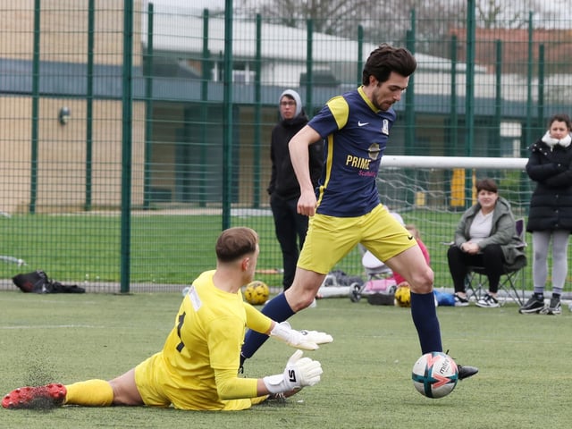 Pelham Arms (blue/yellow) about to score one of their five goals against Fort Cumberland. Picture by Kevin Shipp