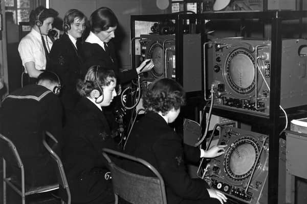 Radar Contriol HMS Dryad
With Joyce Smith nee Wilkinson wearing the headphones we see wrens plotting in the radar room of HMS Dryad, Fareham. This 1954 radar must have been the 'must have' technology in the navy at that time.